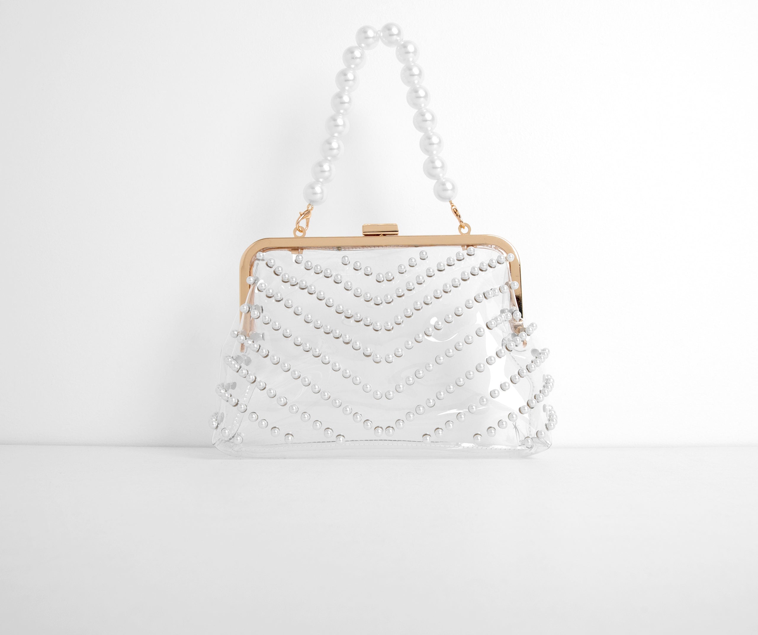 Give A Twirl Clear Pearl Clutch