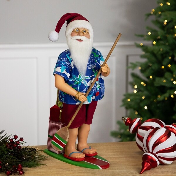 Santa on a Paddle Board Christmas Figure