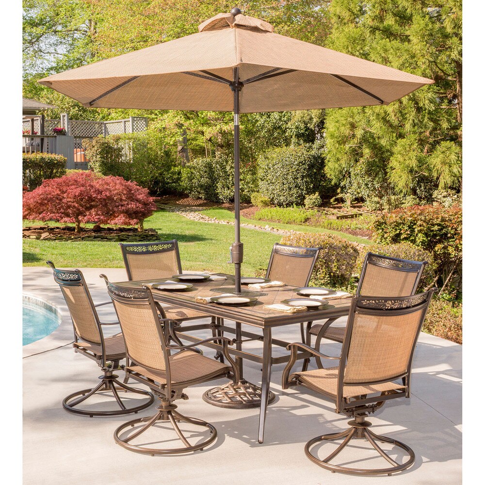 Hanover Fontana 7 Piece Dining Set with Six Swivel Rocking Chairs  a Tile Top Dining Table  9 Ft. Umbrella and Umbrella Stand