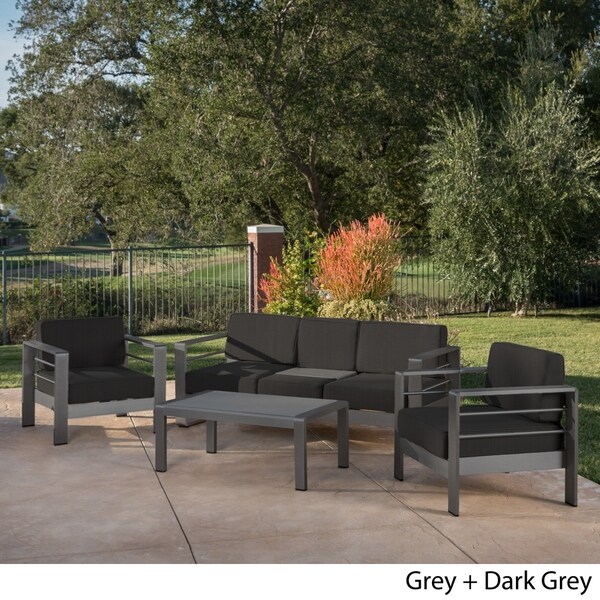 Cape Coral Outdoor Aluminum Tempered Glass 4piece Sofa Chat Set with Cushions by Christopher Knight Home